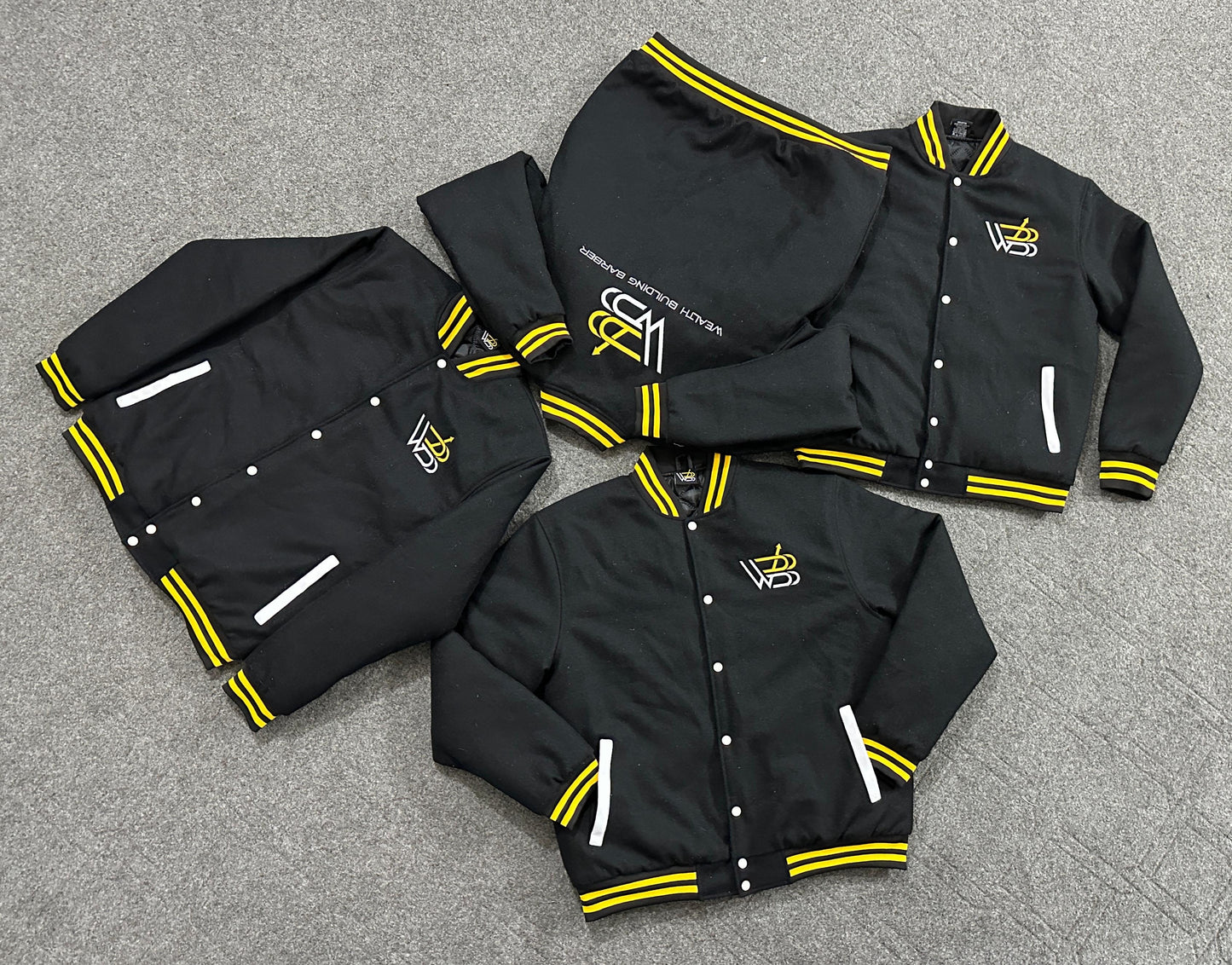 Wealth Building Barber Varsity Jacket