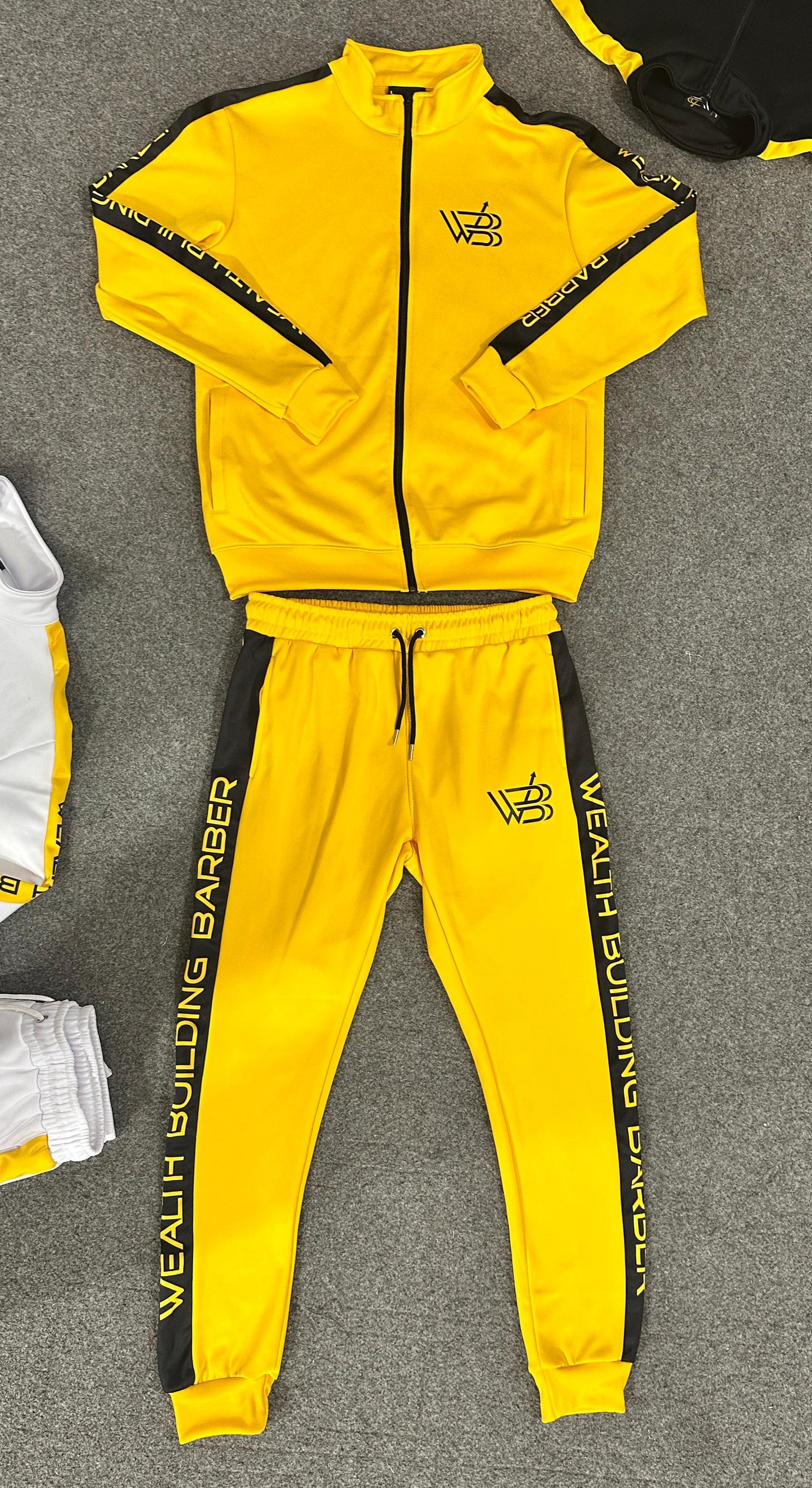 Wealth Building Barber Track suites