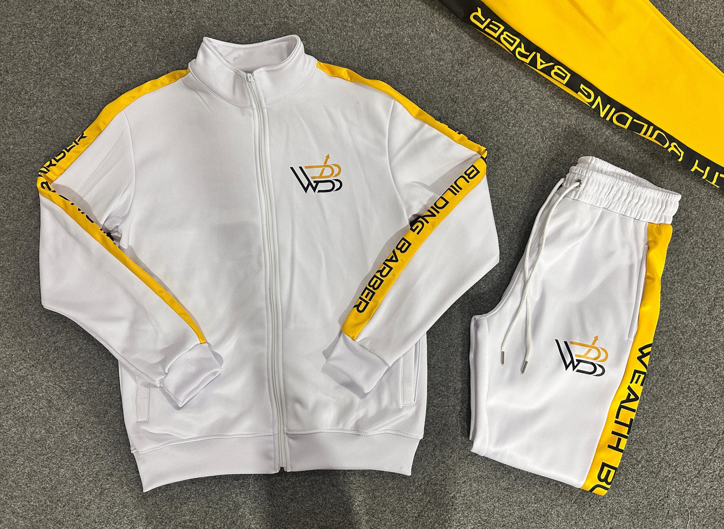 Wealth Building Barber Track suites