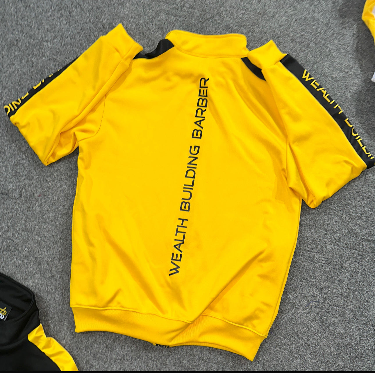 Wealth Building Barber Track suites