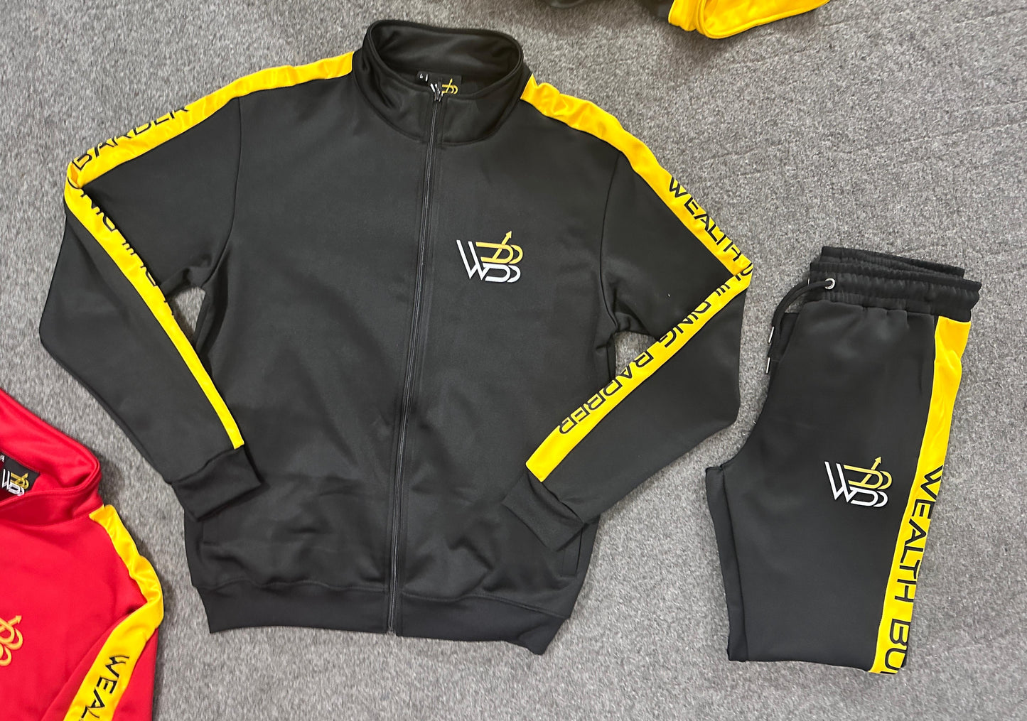 Wealth Building Barber Track suites